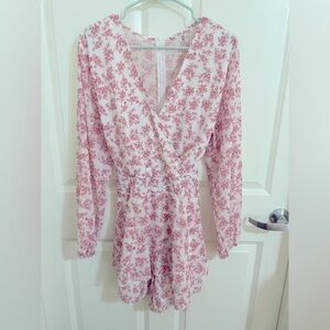 Pink and white floral zip up romper